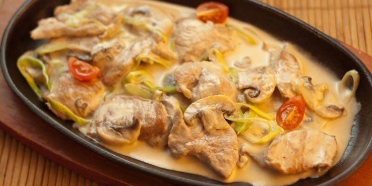 Говядина с овощами, тушеная в сливках