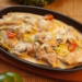 Говядина с овощами, тушеная в сливках
